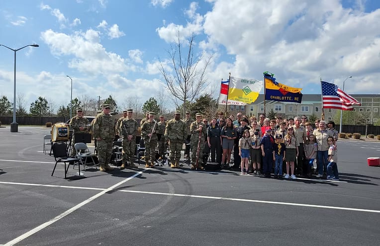 Crew 167 and guests assembled in formation for the flag retirement ceremony