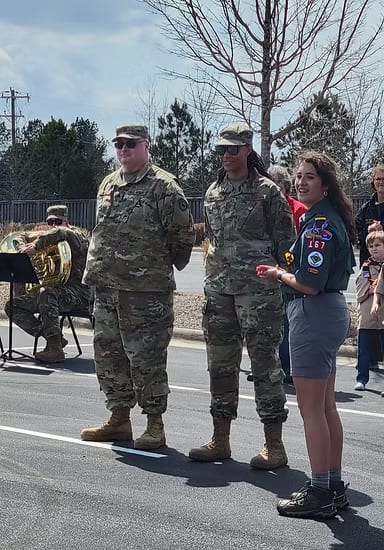 Karis Hunt being recognised by service members at the ceremony