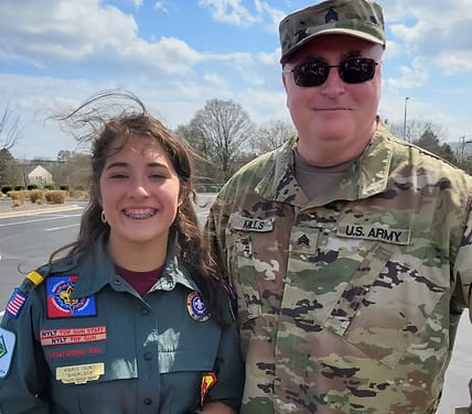 Karis Hunt with a U.S. Army sergeant at the ceremony
